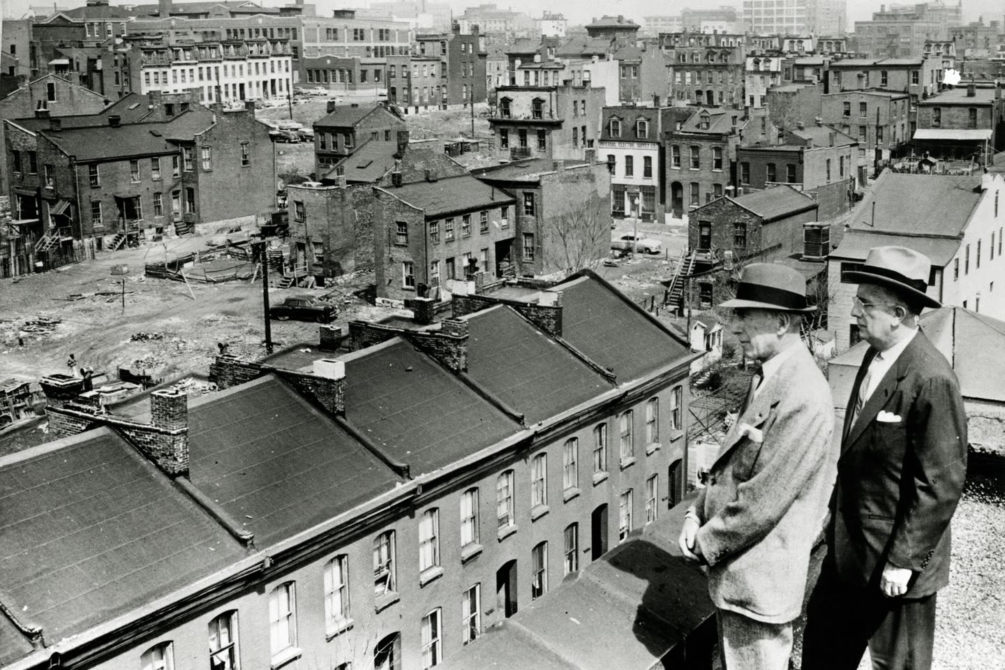 Mayor Raymond Tucker (right) and bond-issue chairman Sidney Maestre survey Mill Creek Valley, 1956